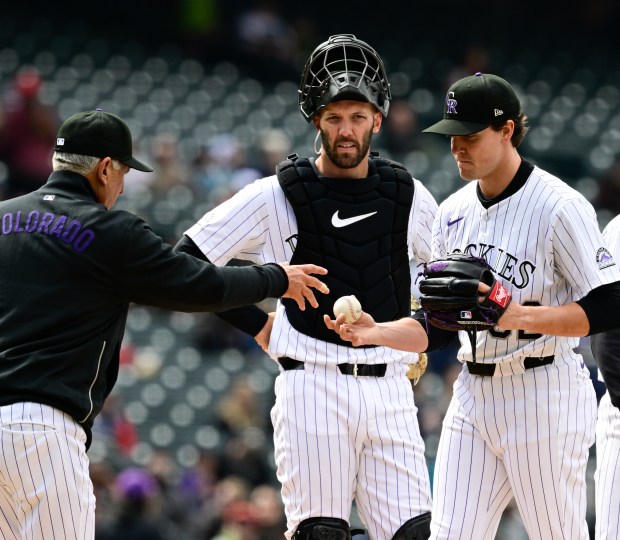 Colorado Rockies' Chase Dollander delivers a pitch to a San Diego Padres' batter in the first inning of a baseball game, April 12, 2025, in San Diego, Calif. (AP Photo/Derrick Tuskan)