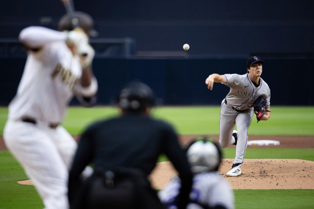 Colorado Rockies' Chase Dollander delivers a pitch to a San Diego Padres' batter in the first inning of a baseball game, April 12, 2025, in San Diego, Calif. (AP Photo/Derrick Tuskan)