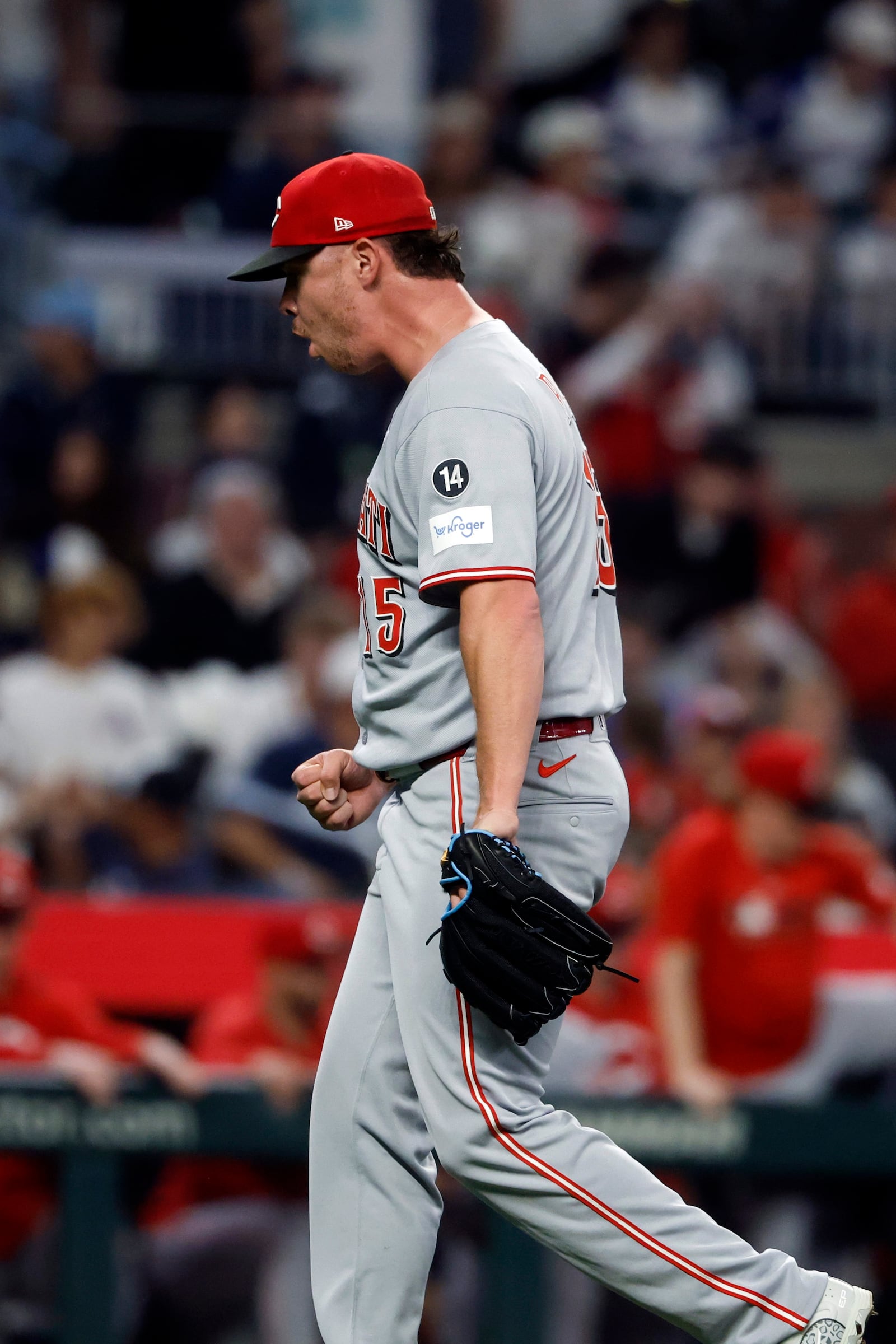 Cincinnati Reds pitcher Emilio Pagán reacts after the team's win over the Atlanta Braves during the ninth inning of a baseball game, Wednesday, May 7, 2025, in Atlanta. (AP Photo/Butch Dill)