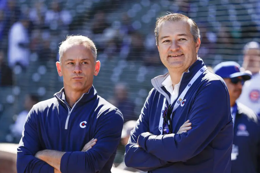 Chicago Cubs Chairman Tom Ricketts (R) smiles next to Chicago Cubs President of baseball operations Jed Hoyer (L) before a baseball game between the Chicago Cubs and Cincinnati Reds at Wrigley Field.