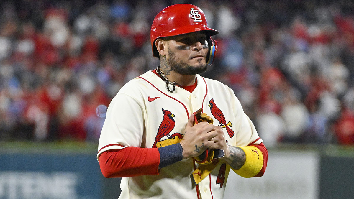 St. Louis Cardinals catcher Yadier Molina (4) walks off the field after hitting a single for his final postseason at bat in the ninth inning against the Philadelphia Phillies during game two of the Wild Card series for the 2022 MLB Playoffs at Busch Stadium. 