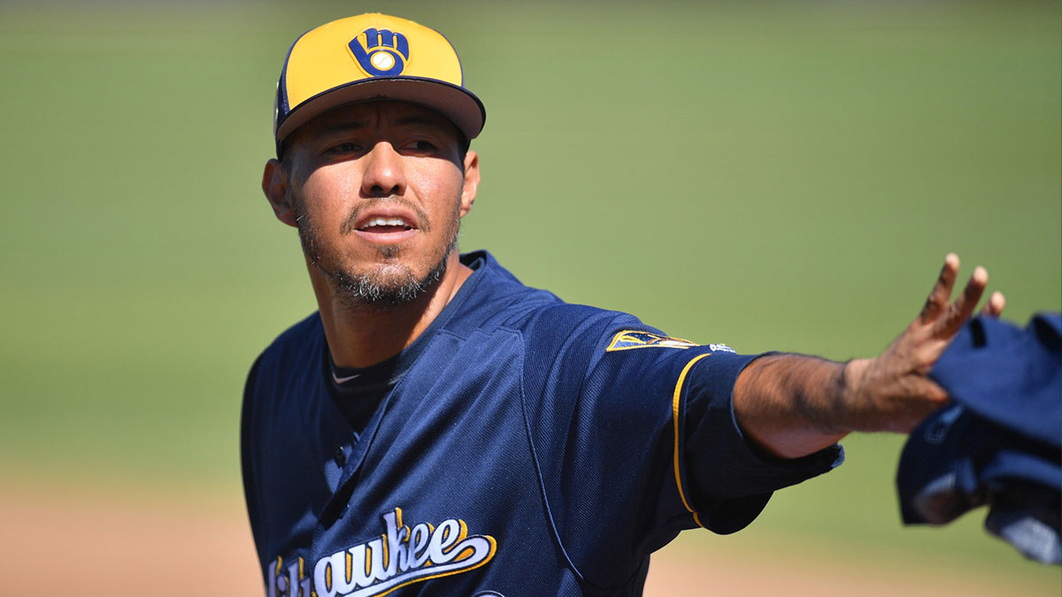  Milwaukee Brewers starting pitcher Yovani Gallardo (49) looks on against the Cleveland Indians during the third inning at Maryvale Baseball Park.
