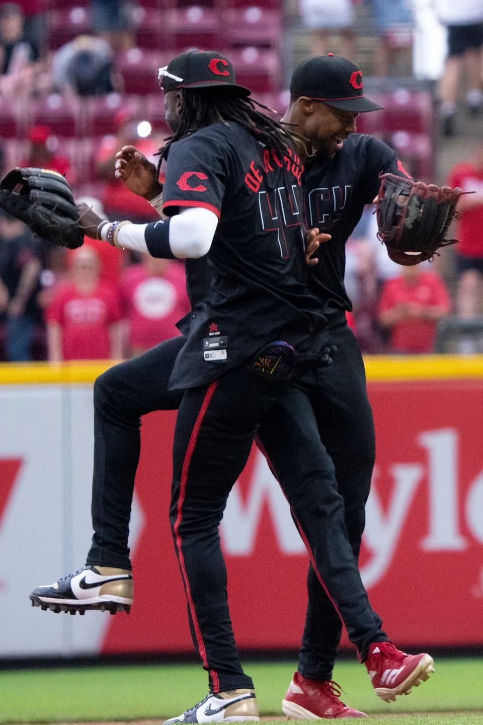 Elly De La Cruz and Will Benson celebrate after the 5-4 victory over the Cleveland Guardians in the opener of the three-game series. De La Cruz went 1-for-3 with a walk and his 15th stolen base.