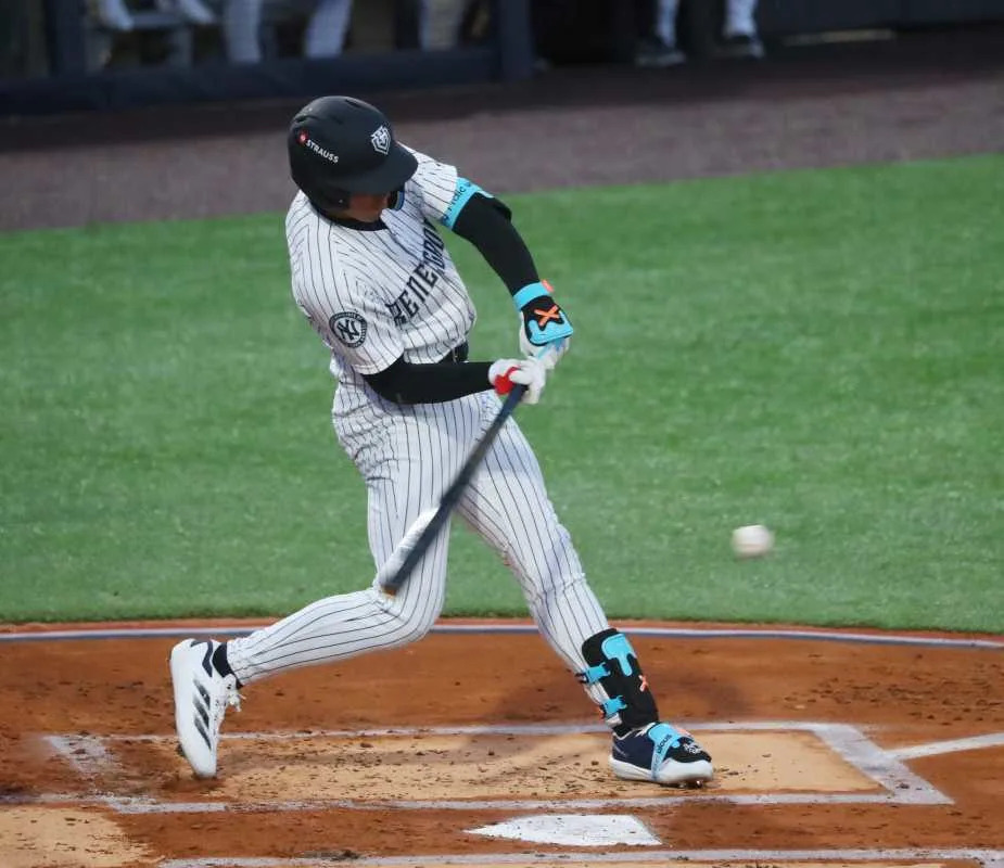 New York Yankees minor leaguer George Lombard Jr. connects with a pitch while batting for the Hudson Valley Renegade at Heritage Financial Park.© Patrick Oehler/Poughkeepsie Journal / USA TODAY NETWORK via Imagn Images