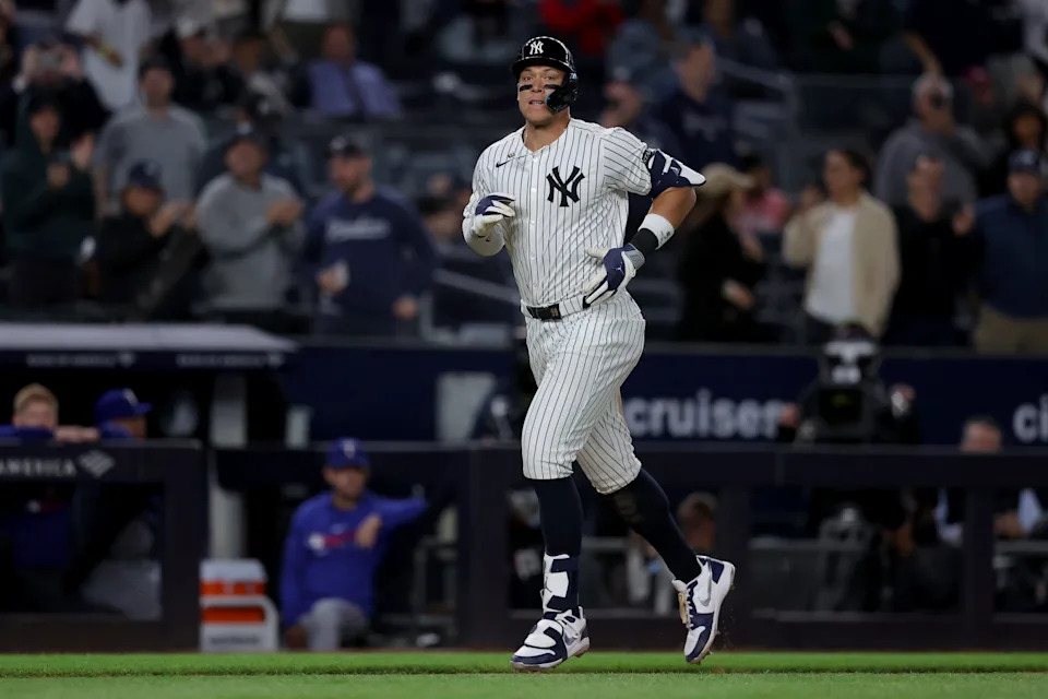 May 20, 2025; Bronx, New York, USA; New York Yankees right fielder Aaron Judge (99) rounds the bases after hitting a two run home run against the Texas Rangers during the eighth inning at Yankee Stadium.