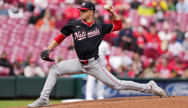 Behind Gore's gutsy outing, Nats survive rain to beat Reds