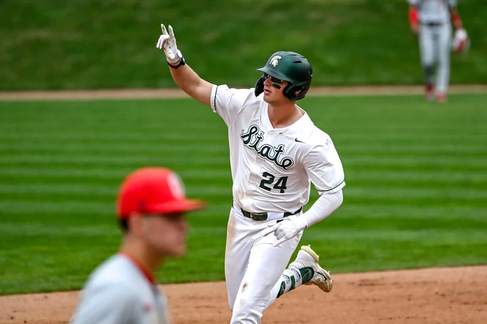 Michigan State's Sam Busch celebrates as he rounds the bases after a home run against Ohio State during the fifth inning on Friday, April 18, 2025, at McLane Stadium in East Lansing.