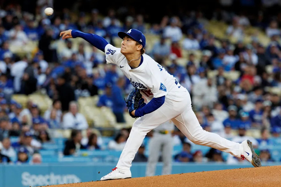 Dodgers pitcher Yoshinobu Yamamoto delivers during the first inning Wednesday against the Athletics.
