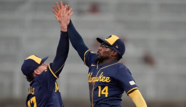 Two baseball players high-fiving