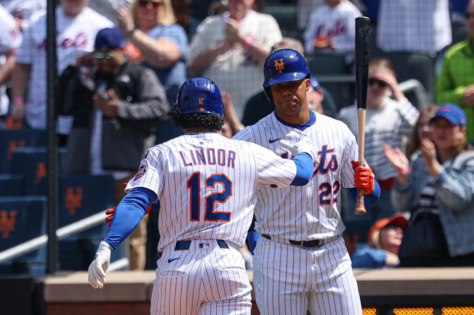 New York Mets shortstop Francisco Lindor (12) celebrates and right fielder Juan Soto (22).Vincent Carchietta-Imagn Images