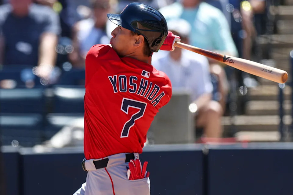 Boston Red Sox outfielder Masataka Yoshida (7) hits a two-run home run.Nathan Ray Seebeck-Imagn Images