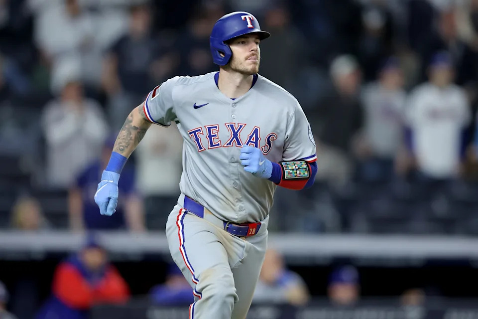 May 20, 2025; Bronx, New York, USA; Texas Rangers catcher Jonah Heim (28) rounds the bases after hitting a two run home run against the New York Yankees during the ninth inning at Yankee Stadium.