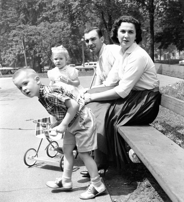 Billy Pierce, southpaw pitcher for the White Sox, spends sunny mornings at a park nearby his Hyde Park home with his son Billy Jr., 4, daughter Patti, 1, and wife, Gloria, circa 1957. The Pierces live at the Flamingo Hotel on South Shore Drive. (Cy Wolf/Chicago Tribune)