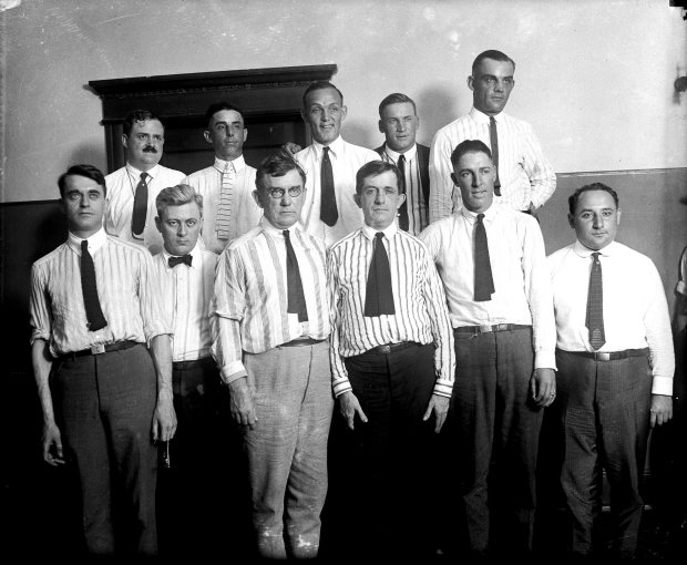 Attorneys and a few White Sox players (in the back) during the Black Sox trial of 1921. Sox players in the back row are third baseman Buck Weaver, center, outfielder Happy Felsch, second from right, and first baseman Chick Gandil, right. Shortstop Swede Risberg is second from right in the front row. (Chicago Tribune historical photo)