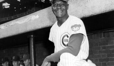 Cubs hire Buck O'Neil who becomes first Black coach in major league history