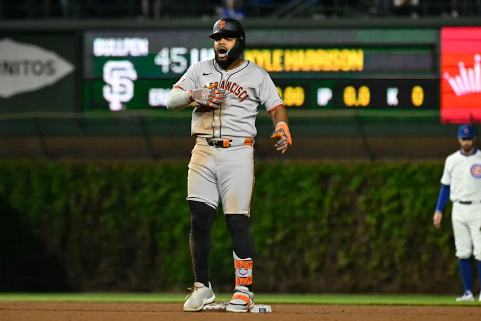 San Francisco Giants outfielder Heliot Ramos (17) celebrates hitting a double against the Chicago Cubs.Matt Marton-Imagn Images