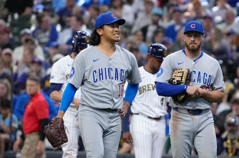 Chicago Cubs pitcher Shota Imanaga (18) walks toward the mound to be checked out by a trainer after being injured against the Milwaukee Brewers in the sixth inning at American Family Field.Michael McLoone-Imagn Images