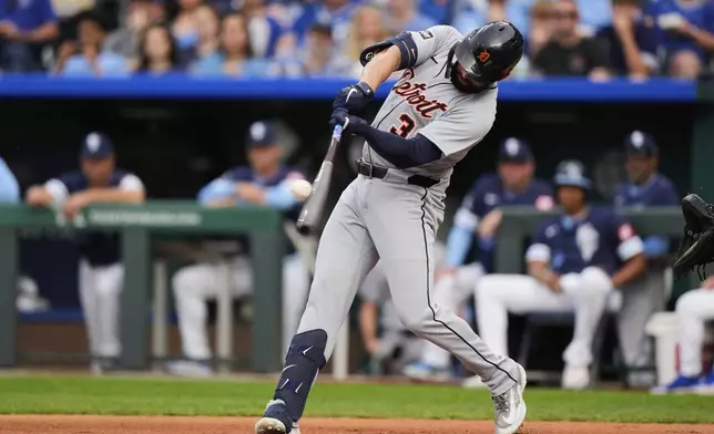 Detroit Tigers' Riley Greene hits a two-run home run during the first inning of a baseball game against the Kansas City Royals, Friday, May 30, 2025, in Kansas City, Mo. (AP Photo/Charlie Riedel)