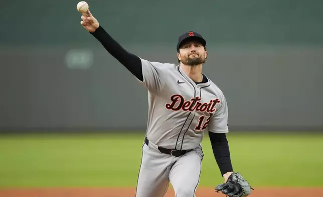 Detroit Tigers starting pitcher Casey Mize throws during the first inning of a baseball game against the Kansas City Royals, Friday, May 30, 2025, in Kansas City, Mo. (AP Photo/Charlie Riedel)