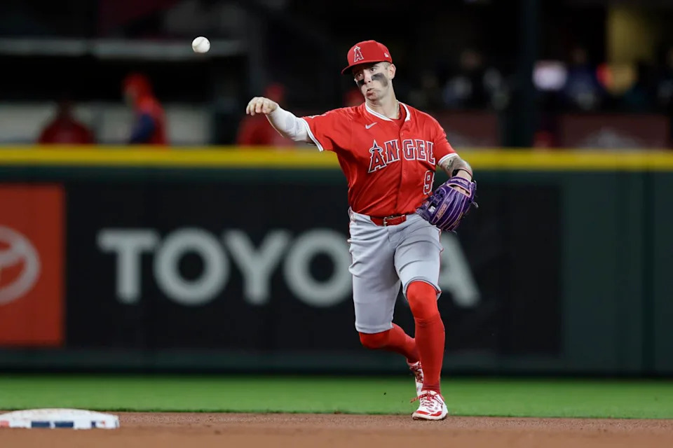 Angels shortstop Zach Neto makes a throws to first base against the Seattle Mariners on April 29.