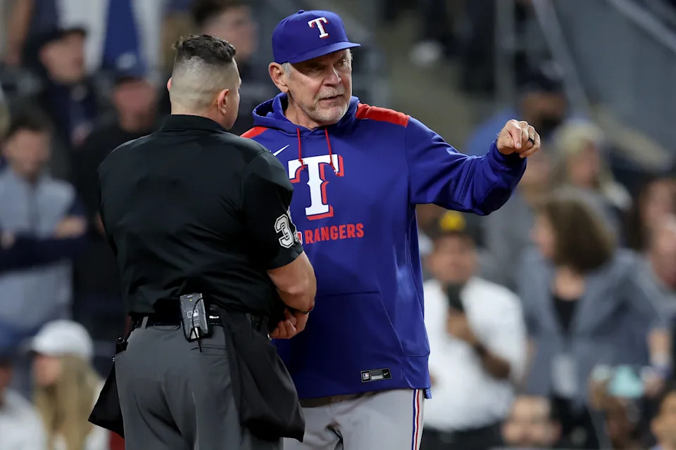 May 20, 2025; Bronx, New York, USA; Texas Rangers manager Bruce Bochy (15) argues with home plate umpire Carlos Torres (37) after being ejected during the sixth inning against the New York Yankees at Yankee Stadium.