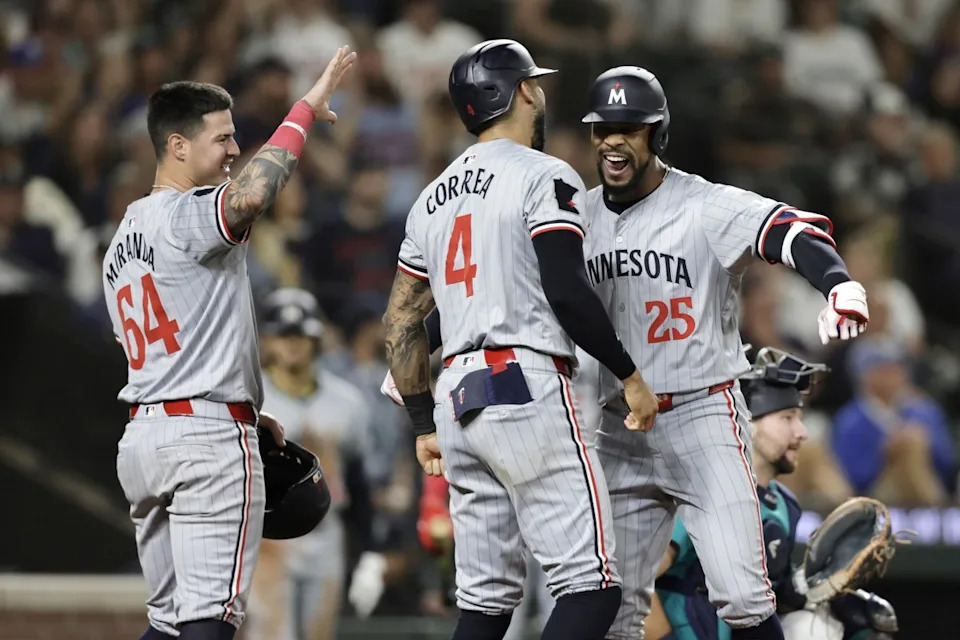 Minnesota Twins celebrate after scoring a run.John Froschauer-Imagn Images