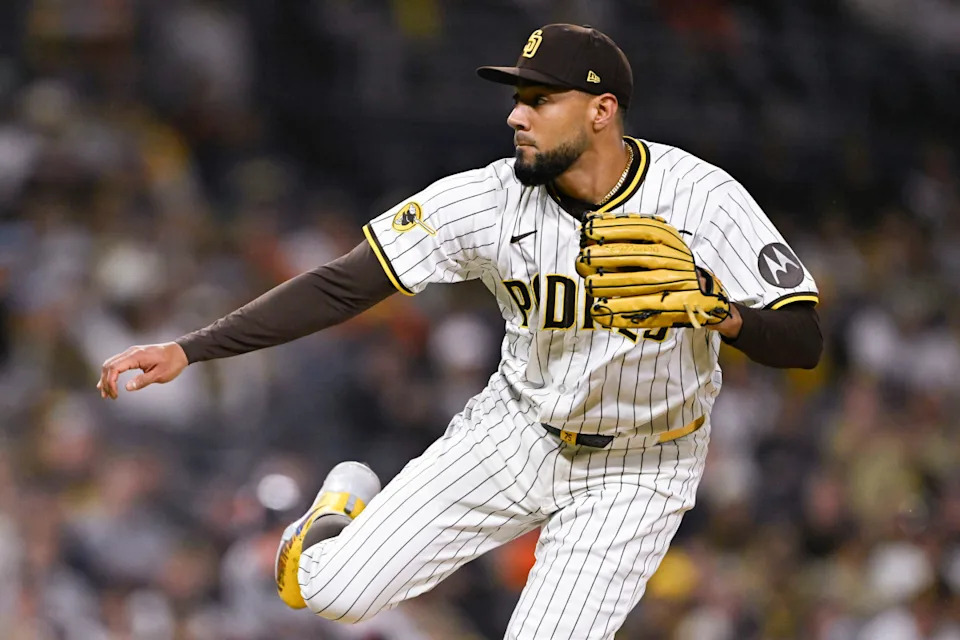 San Diego Padres pitcher Robert Suarez (75) delivers a pitch during the ninth inning against the San Francisco Giants at Petco Park.Denis Poroy-Imagn Images