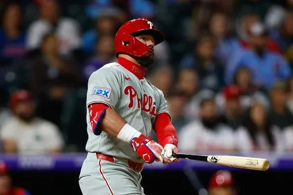 Kyle Schwarber of the Philadelphia Phillies watches his home run