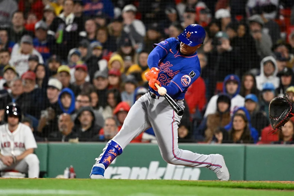 Juan Soto (22) hits a single against the Boston Red Sox during the sixth inning at Fenway Park. IMAGN IMAGES via Reuters Connect