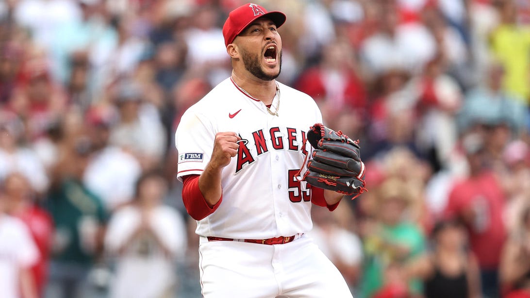 ANAHEIM, CALIFORNIA - JULY 23: Carlos Estevez #53 of the Los Angeles Angels reacts after closing out the game to get a 7-5 win against the Pittsburgh Pirates in the ninth inning at Angel Stadium of Anaheim on July 23, 2023 in Anaheim, California.