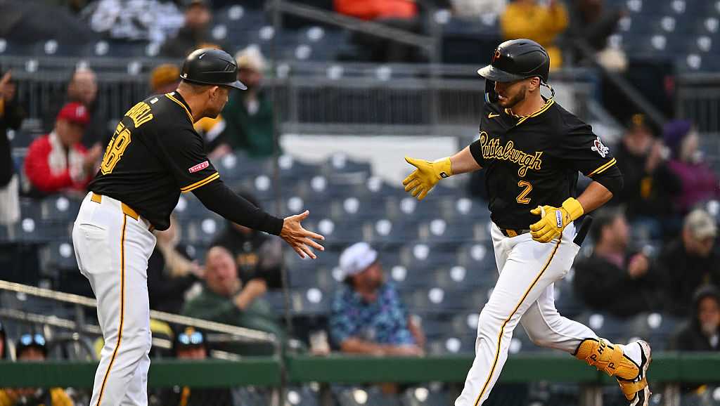 Yelich homers twice and the Brewers hold off the Pirates 8-5 after a long rain delay