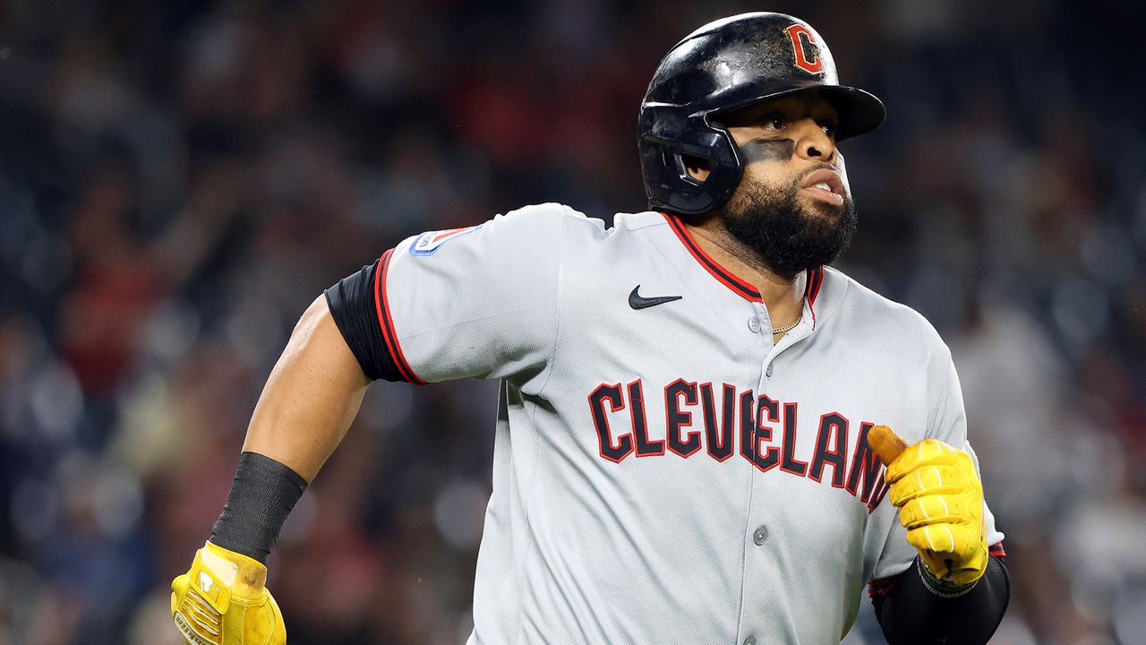 Cleveland Guardians' Carlos Santana hits a home run during the sixth inning of the second baseball game of a doubleheader against the Washington Nationals, Tuesday, May 6, 2025, in Washington. (AP Photo/Daniel Kucin Jr.)