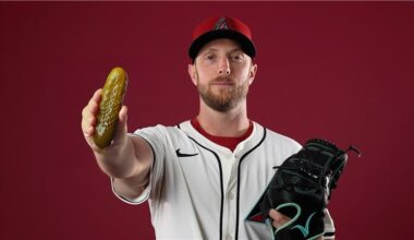 Graphic: D-backs starting pitcher Merrill Kelly holds a pickle...