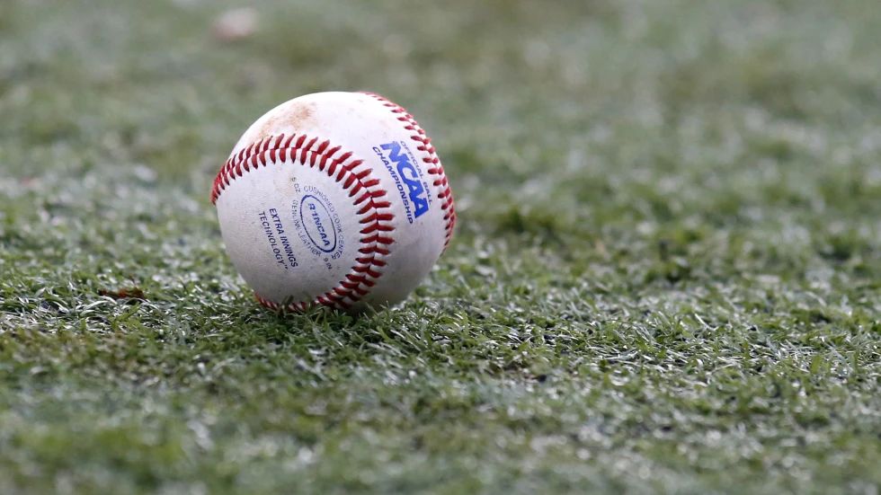The NCAA logo is seen on a baseball during an NCAA college baseball tournament regional game between Louisiana-Lafayette and Mississippi State in Lafayette, La., Monday, June 2, 2014. (AP Photo/Jonathan Bachman, file)