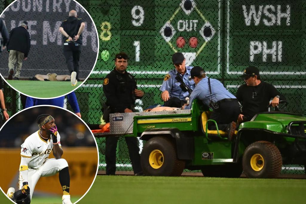 Fan at Pirates game falls 21 feet onto playing field in scary scene