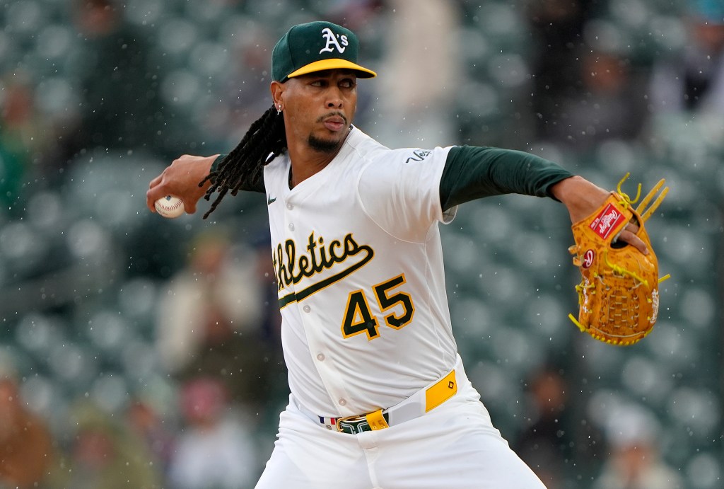 Osvaldo Bido of the Athletics pitching at Sutter Health Park.