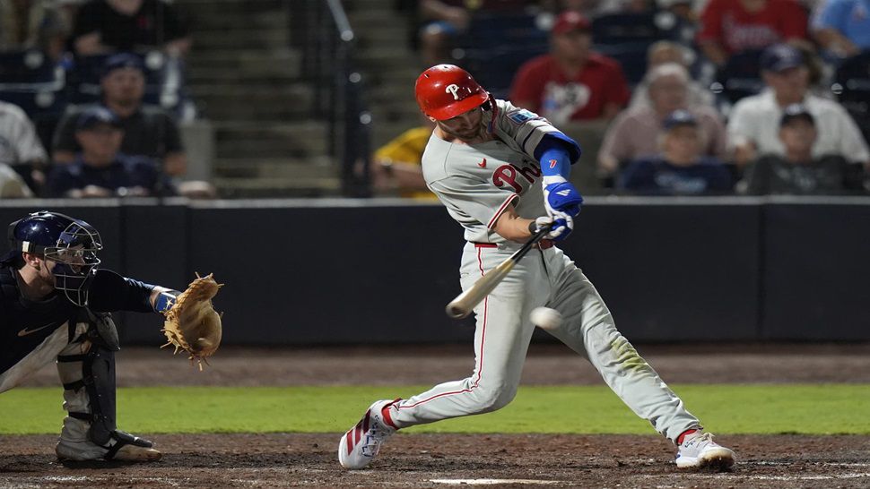 Philadelphia Phillies' Trea Turner connects for an RBI single off Tampa Bay Rays pitcher Manuel Rodríguez during the 10th inning of a baseball game Thursday, May 8, 2025, in Tampa, Fla. (AP Photo/Chris O'Meara)
