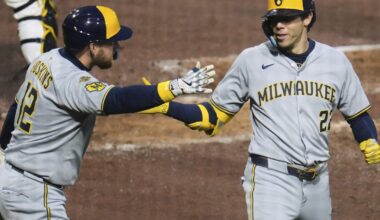 Brewers hold off the Pirates 8-5 after a long rain delay