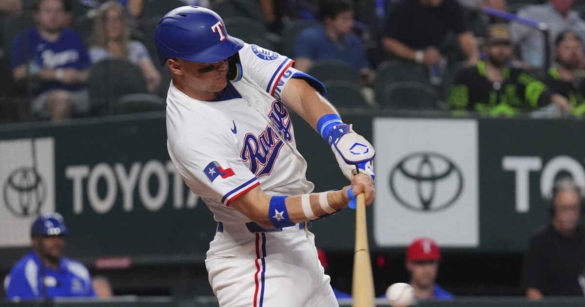 Jung's 2 homers back Leiter's solid start as Rangers beat struggling Rockies 4-1