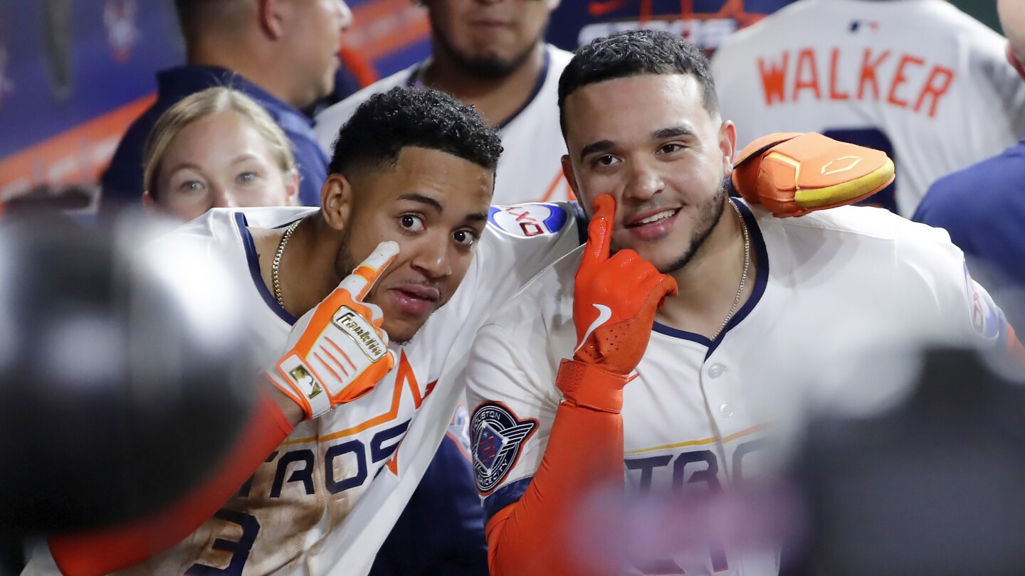 Díaz's first career grand slam helps Houston Astros to 14-3 rout of Los Angeles Angels