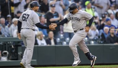 Grisham hits 2 homers to lead Yankees past Mariners 11-5, New York's Cabrera leaves in ambulance