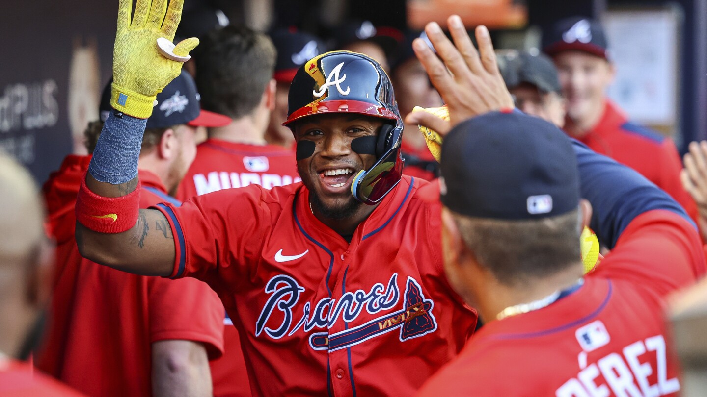 Machado homers in 9th as Padres overcome Acuña's dramatic return, beat Braves 2-1 to end 6-game skid