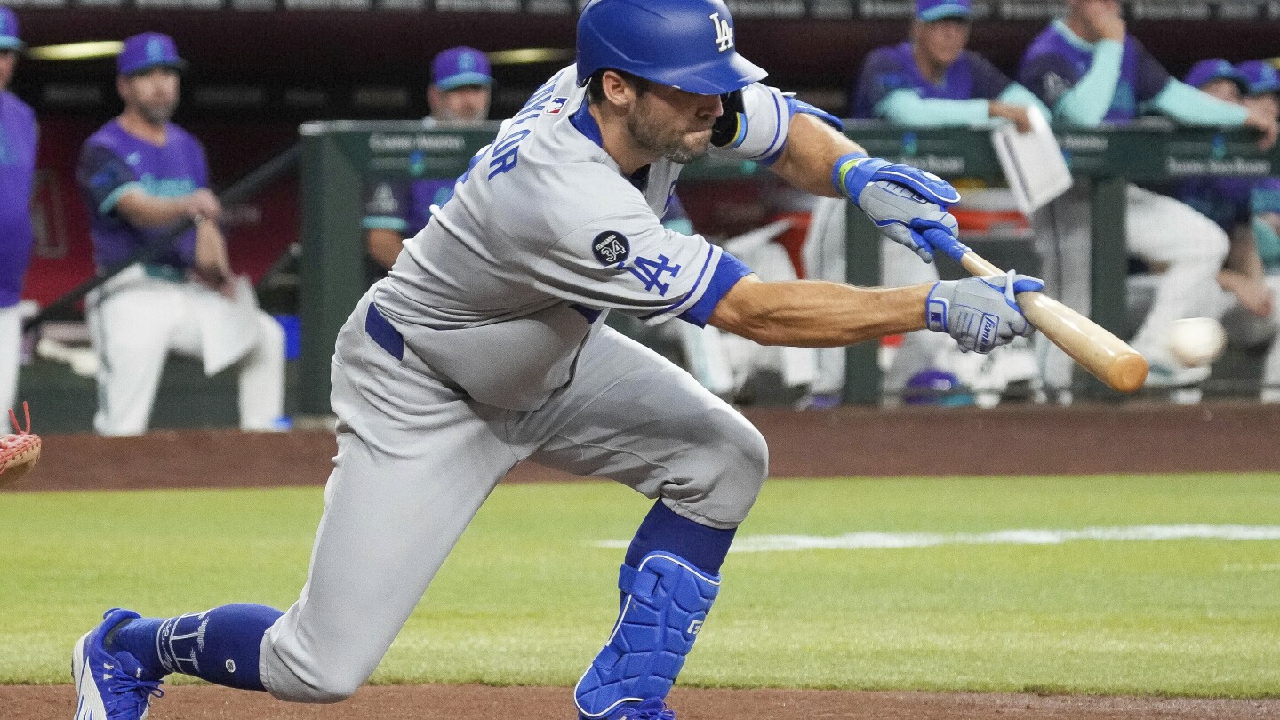 Chris Taylor released by Dodgers, who owe him $13.4 million