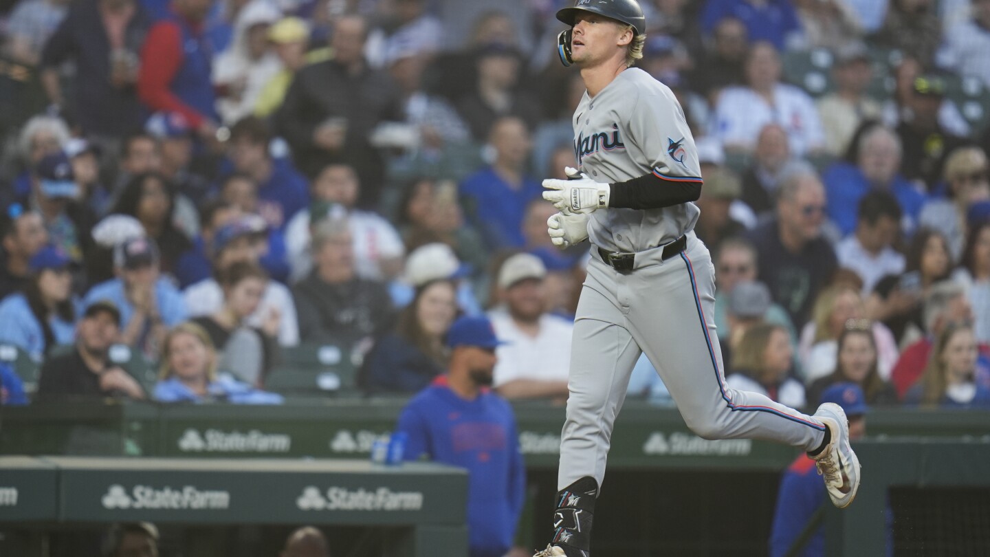 Stowers homers twice, Weathers strong in return to lead Marlins over Cubs 3-1