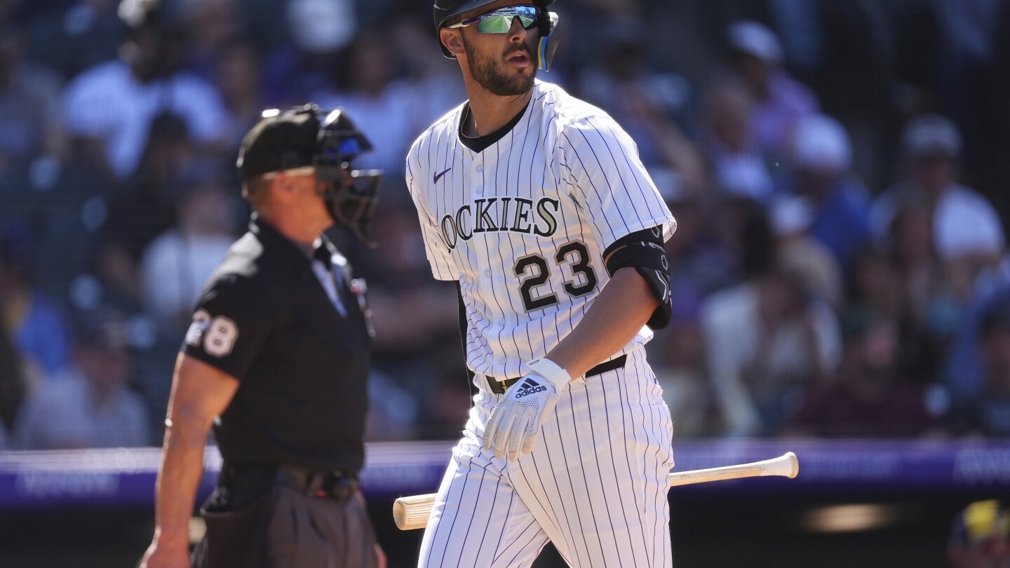 Rockies designated hitter Kris Bryant slated for a procedure on his back Thursday in Los Angeles