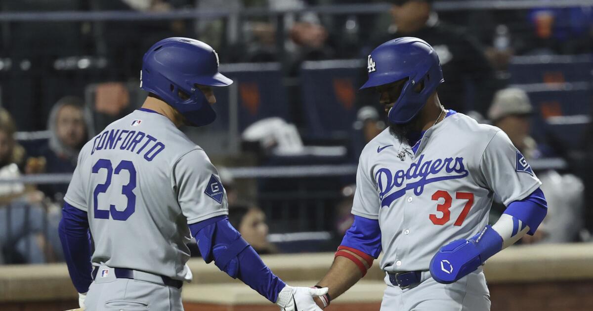 Dodgers overcome bullpen woes and rain to beat Mets in 13 innings