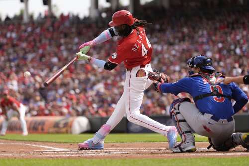 Reds hold off Cubs 6-4 as catcher Amaya exits with oblique strain