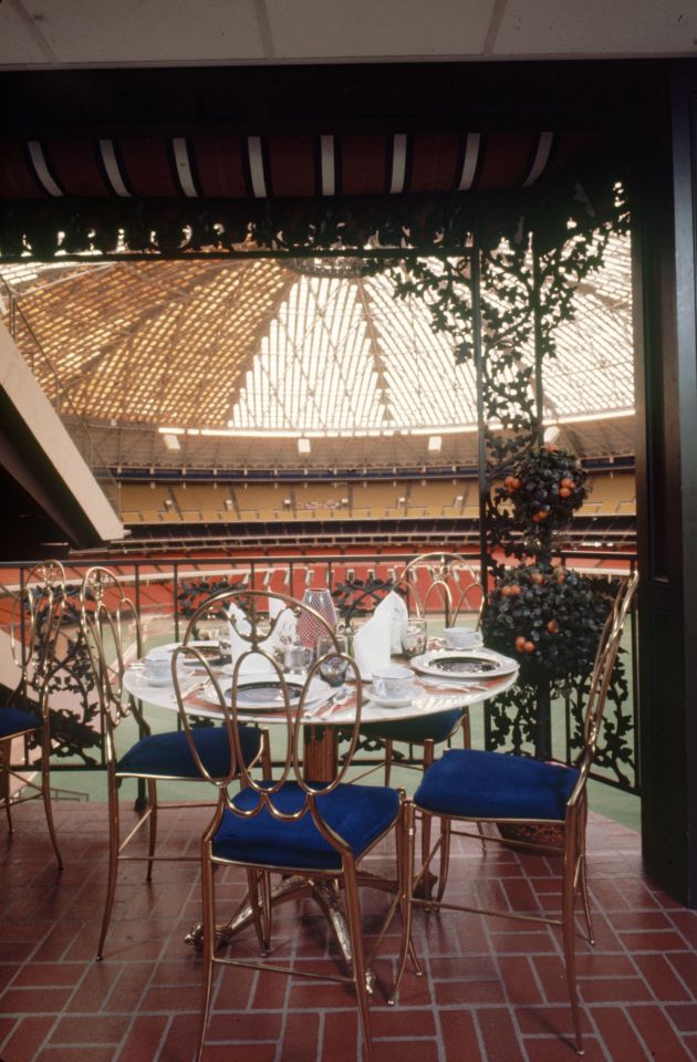Restaurant table overlooking a stadium.