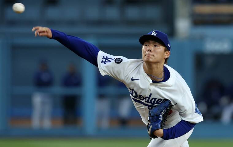 JASON PARKHURST-IMAGN IMAGES
Los Angeles Dodgers pitcher Yoshinobu Yamamoto throws a pitch during the second inning at Dodger Stadium on May 14.