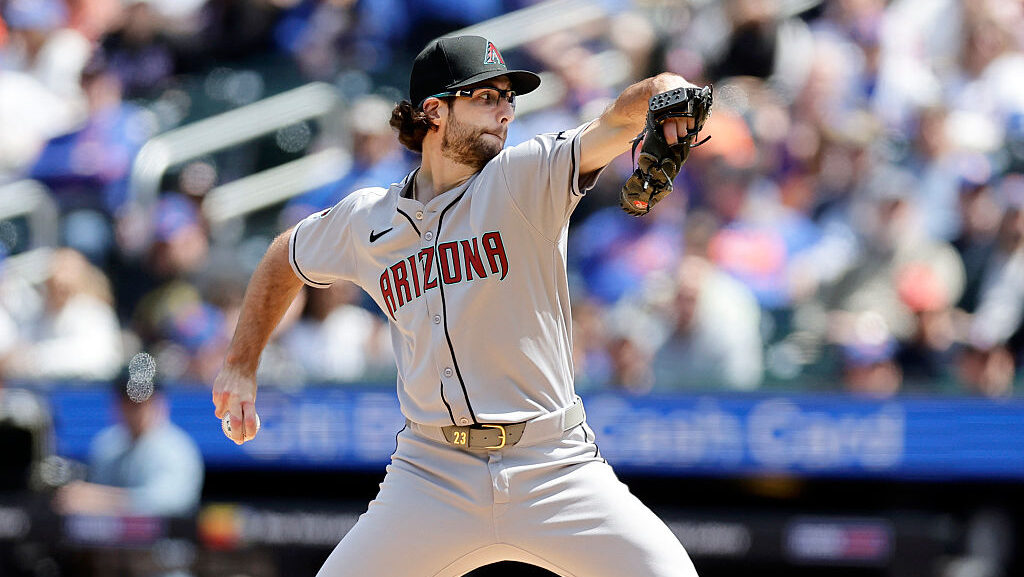 Zac Gallen winds up to pitch...